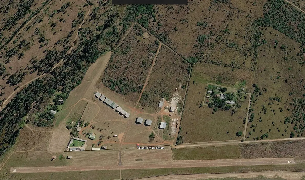 Satellite view of Bundu Fly-Inn Estate showing the runway, hangars and residences